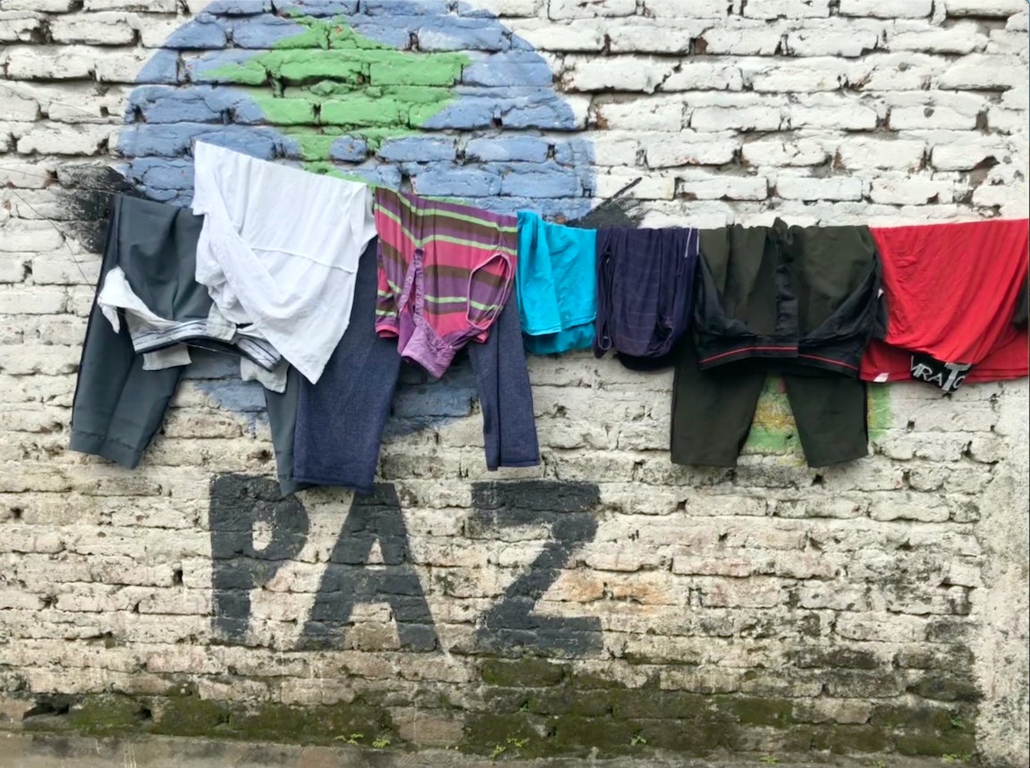 Graffiti in the city of Tumaco, Colombia, where FARC dissident groups operate, says "peace."