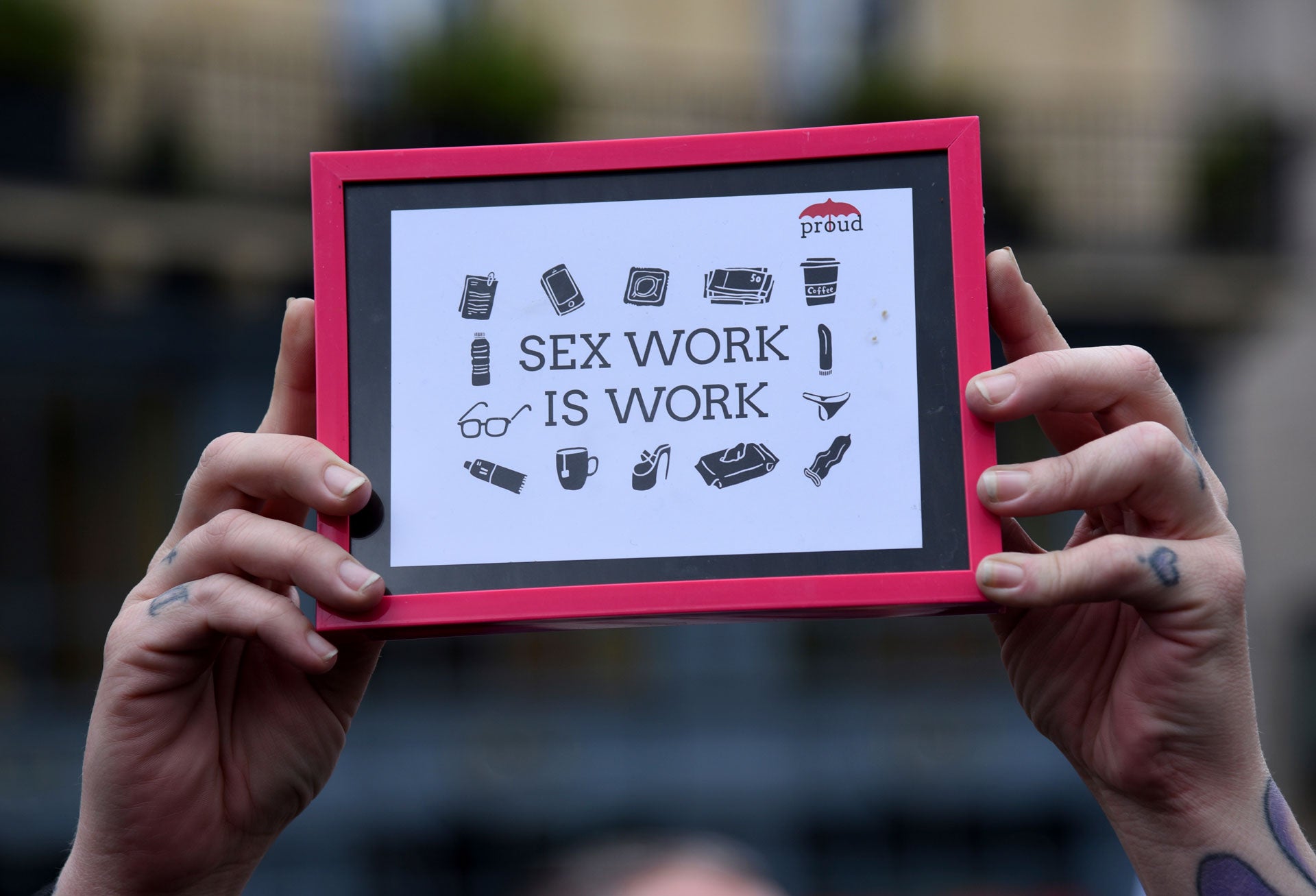 People demonstrate in support of sex workers, April 14, 2018. 