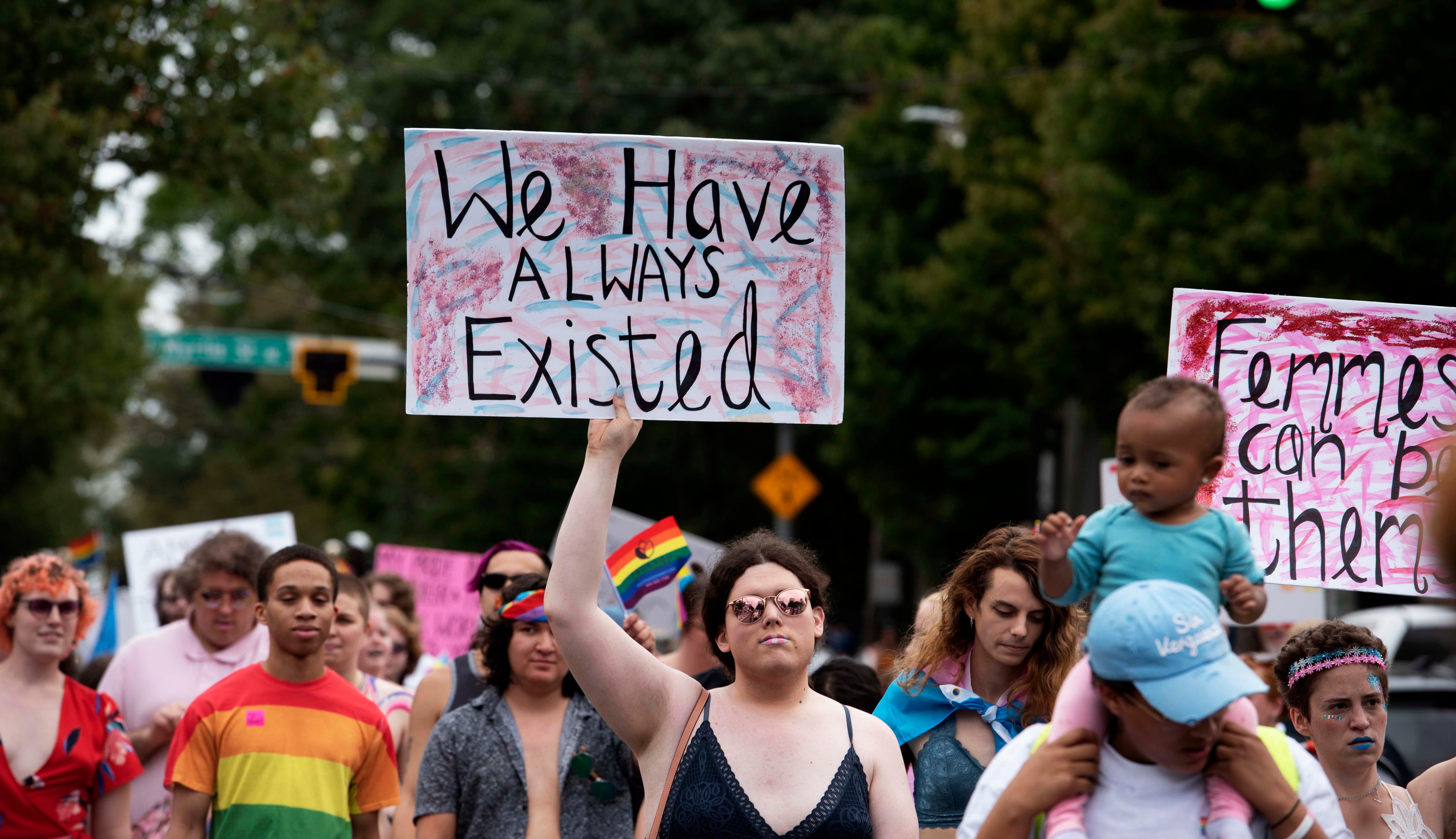 Transgender and non-binary individuals and their allies stroll through Atlanta’s Midtown district during Pride’s Transgender Rights March on Saturday, Oct. 12, 2019. 