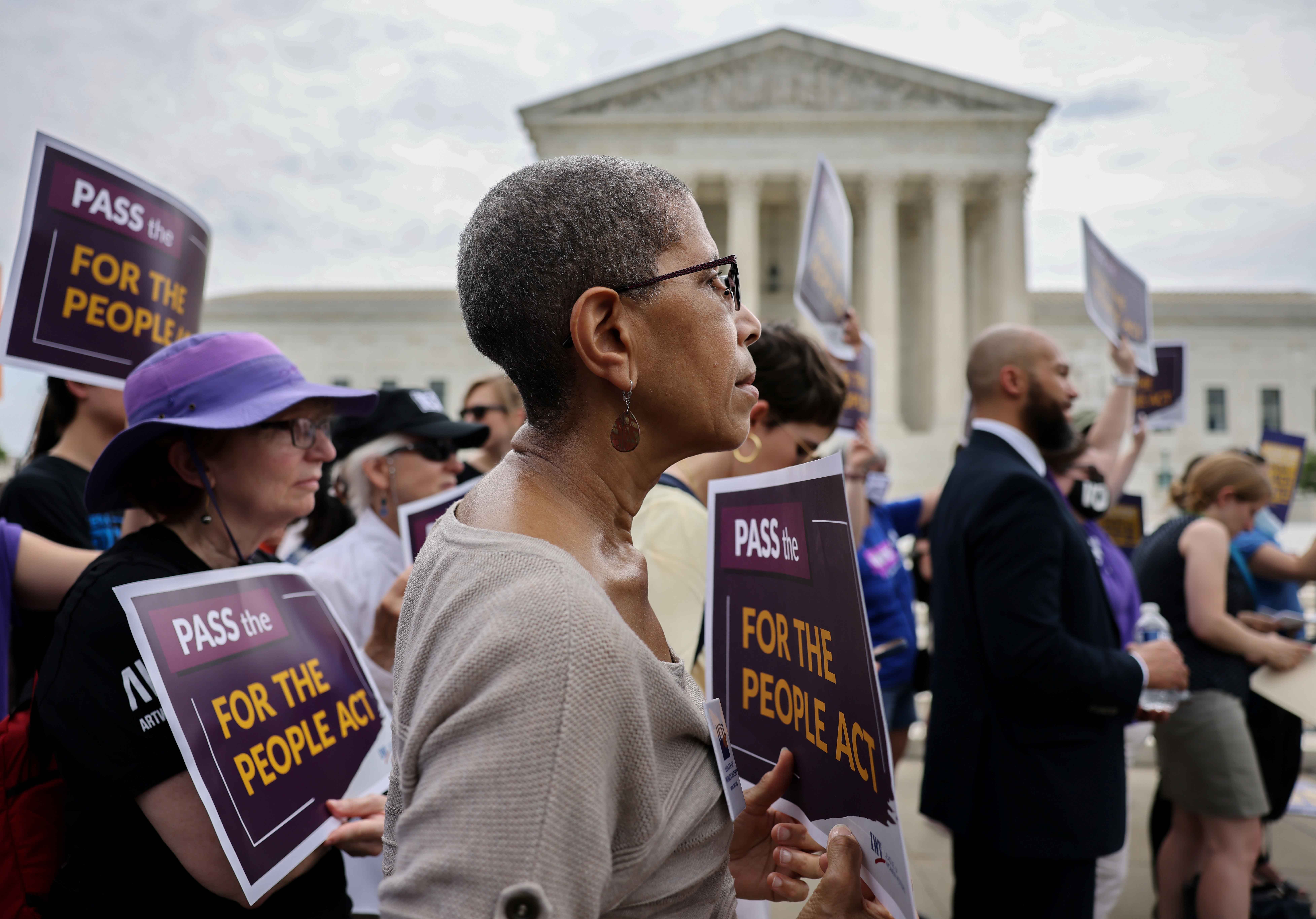 Linda Jacks, 70, from Silver Spring, Maryland attends a rally outside of the US Supreme Court in Washington, DC, in support of the For the People Act on June 9, 2021.