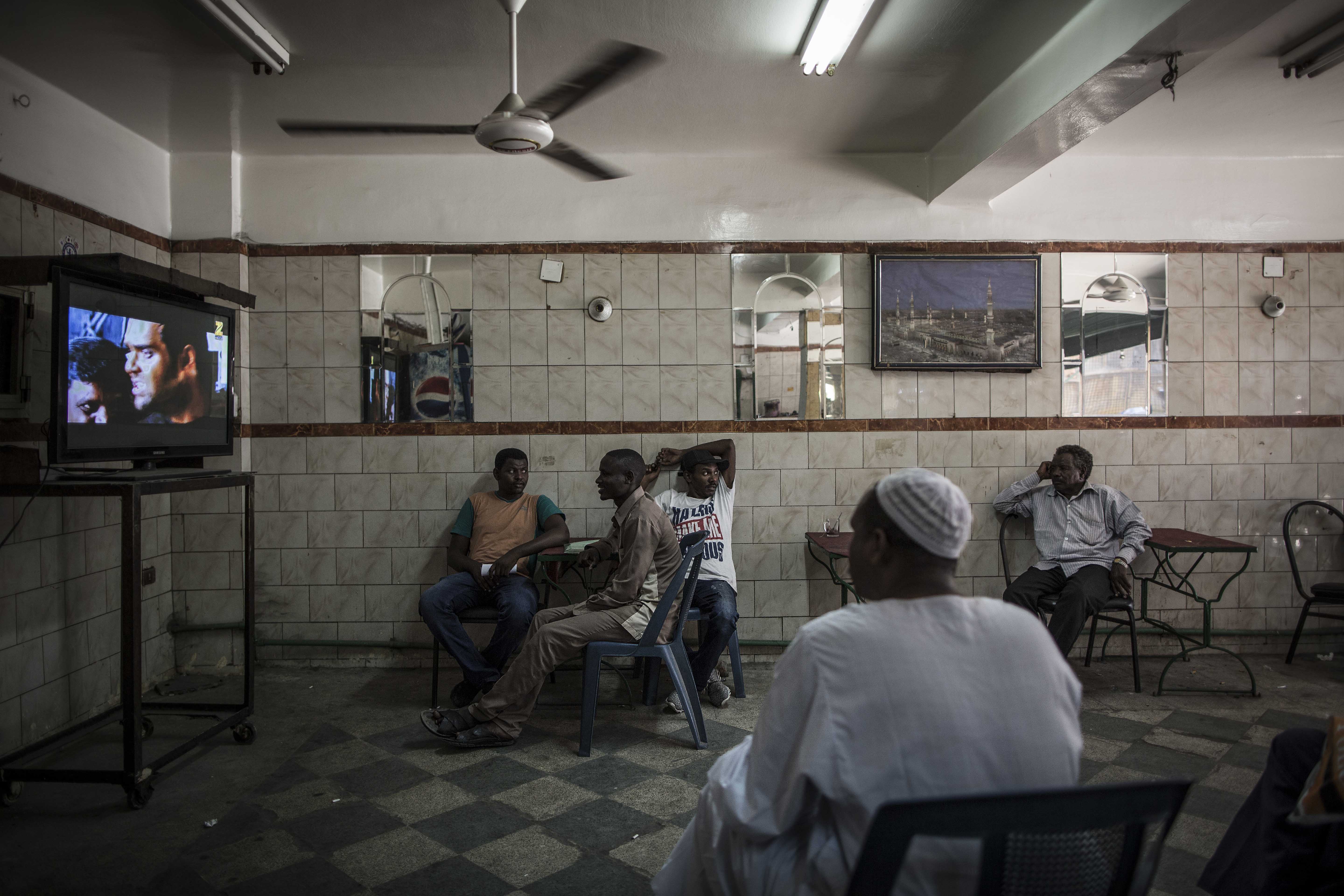 Men sitting in a cafe predominantly visited by Sudanese migrants in Cairo, Egypt, 08 August 2017.