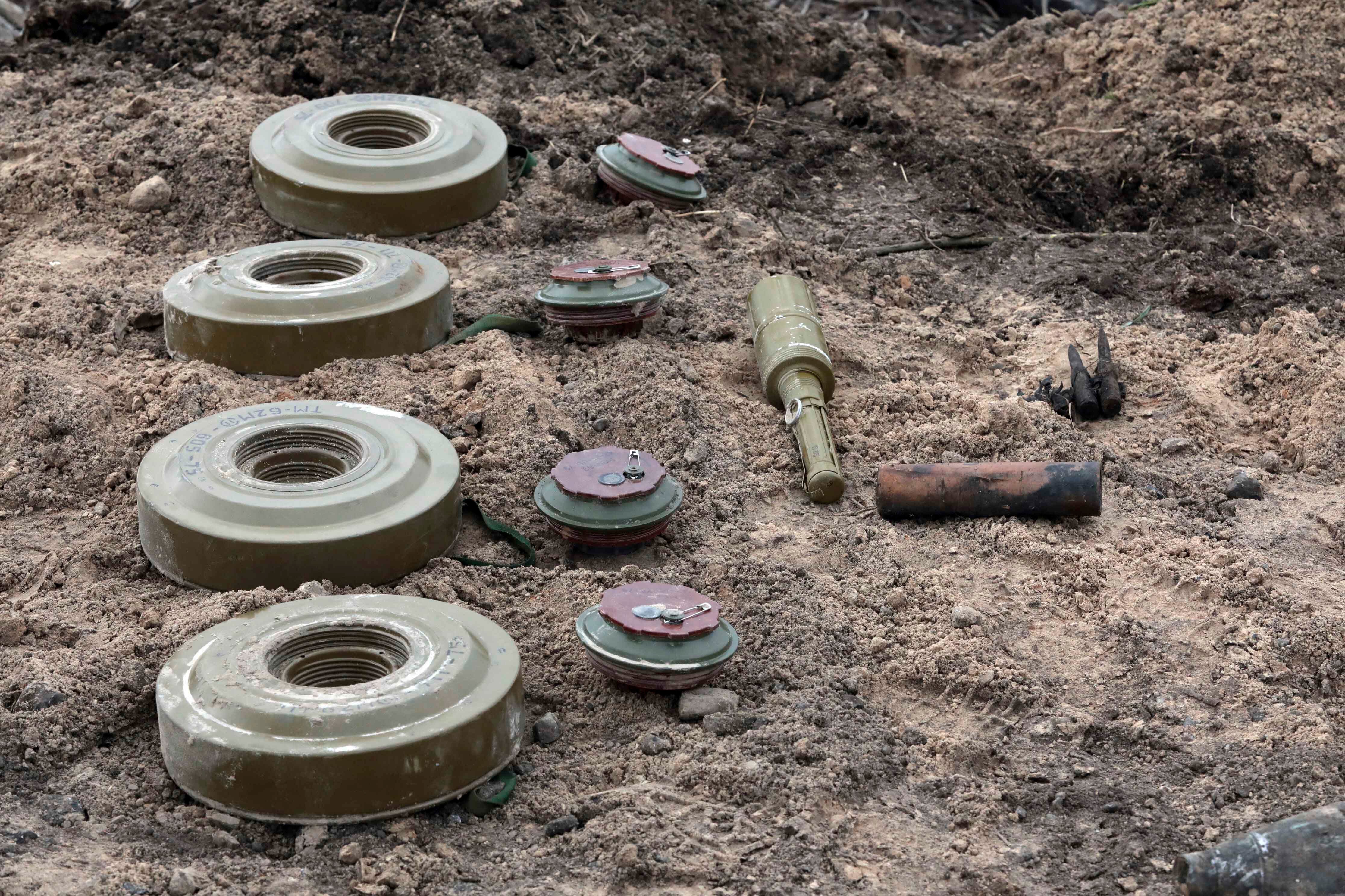 TM-62 anti-vehicle mines found during a mine clearance mission near Bervytsia, a village previously occupied by Russian forces, Kyiv region, Ukraine, April 21, 2022. 