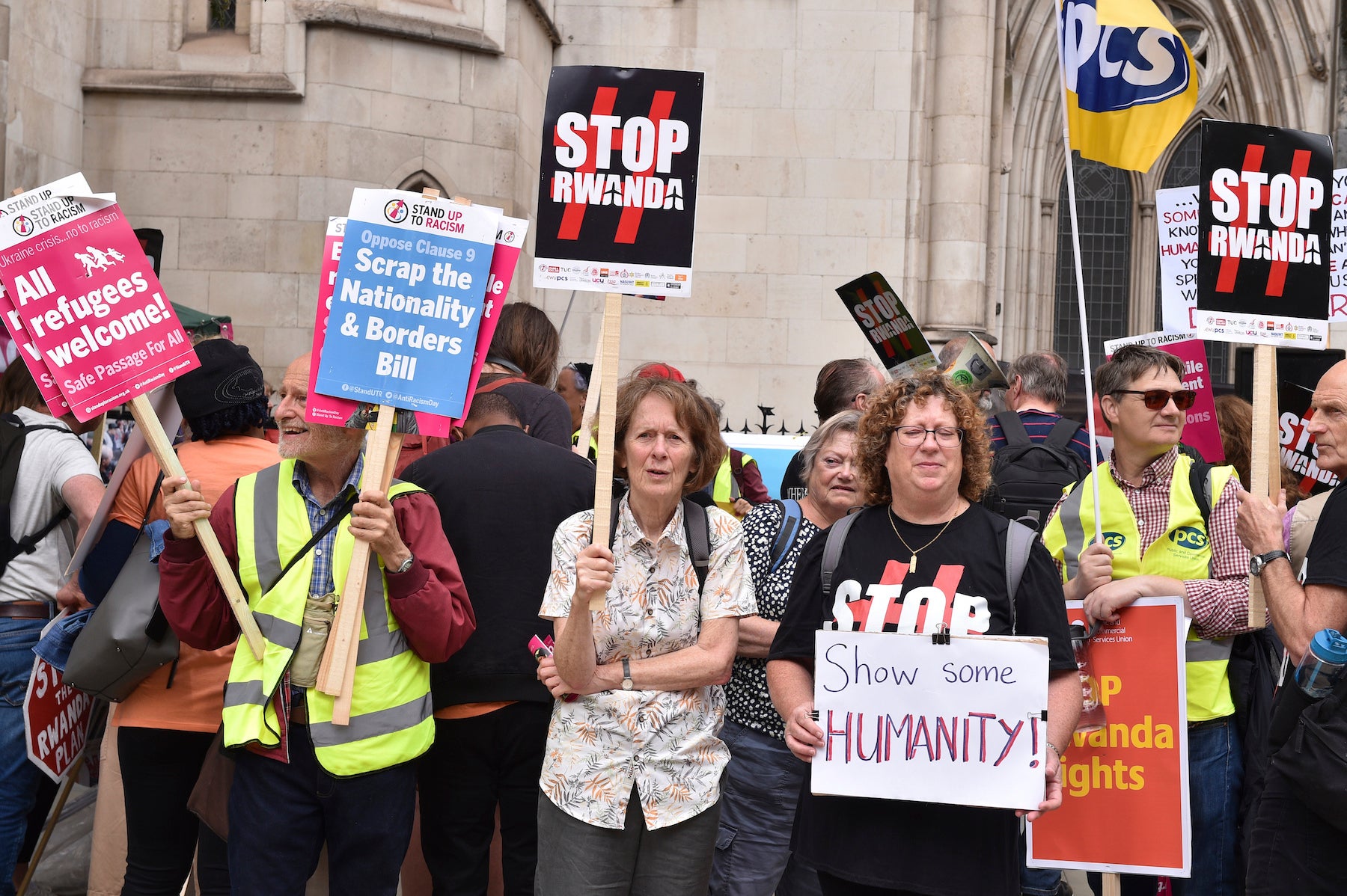 Protesters gathered opposite The Royal Courts Of Justice over UK's agreement with Rwanda. 