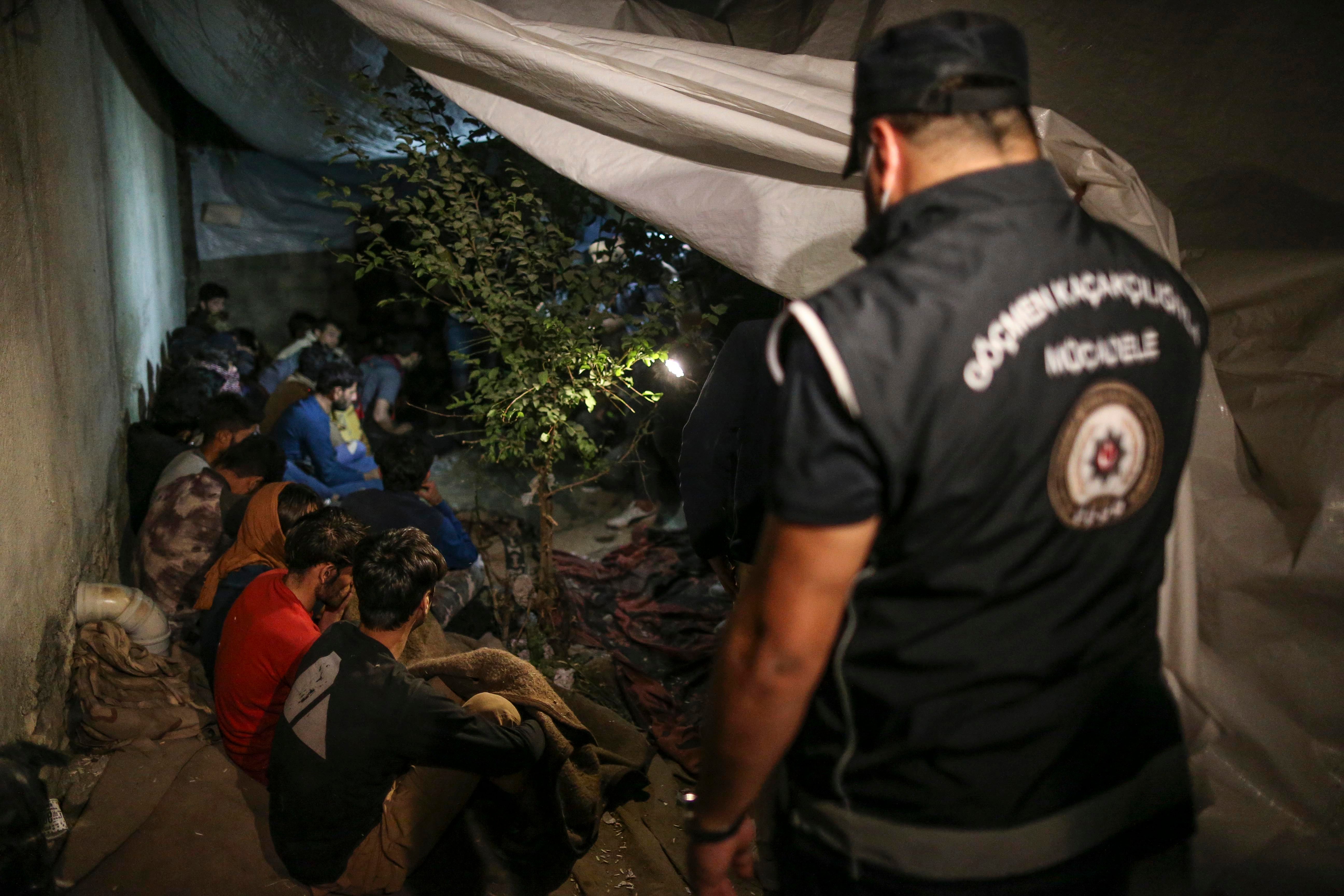 Turkish security forces detain a group of migrants in Van Province, near Turkey’s border with Iran. August 21, 2022.