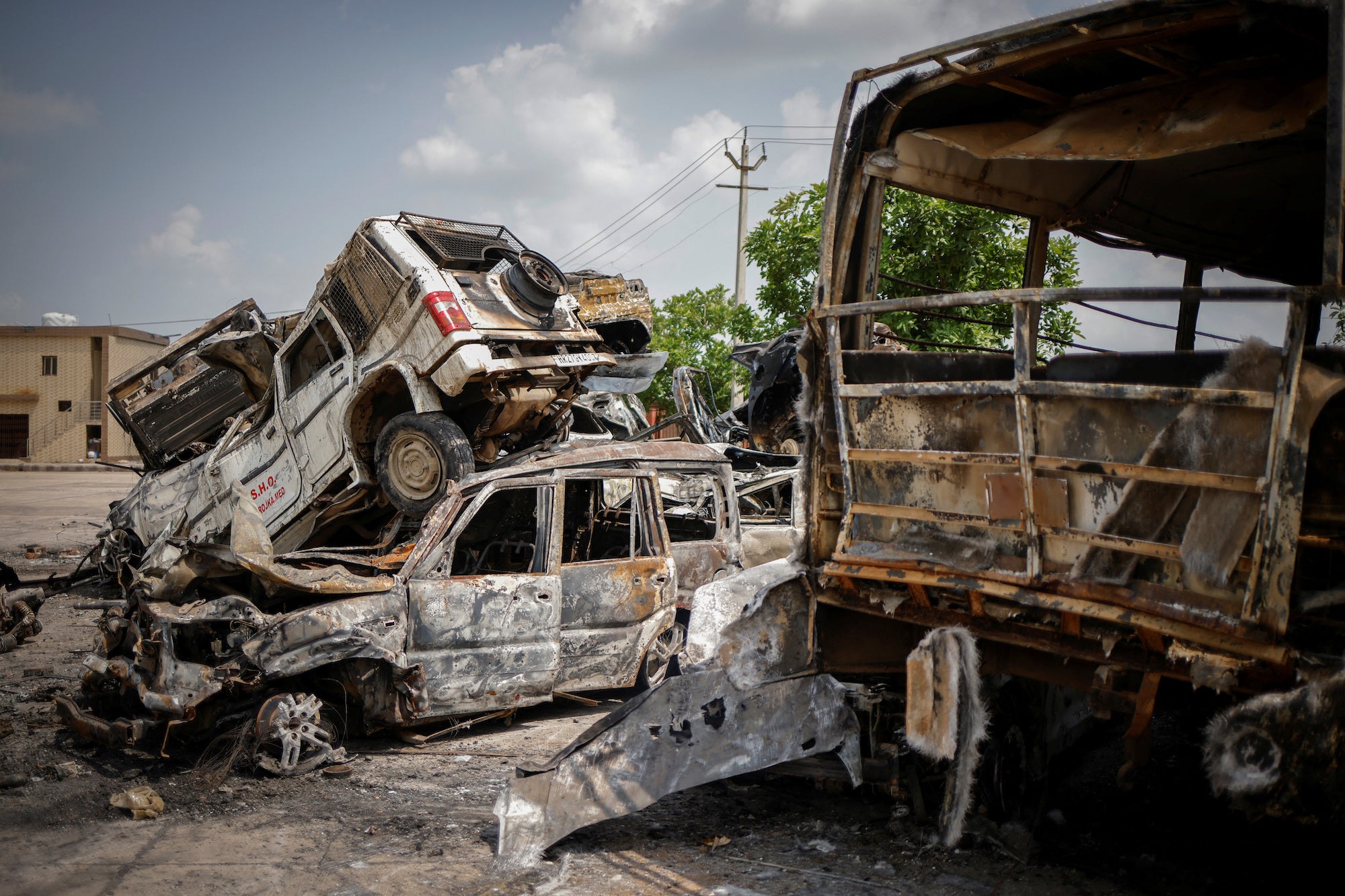 Burnt vehicles are pictured following clashes between Hindus and Muslims in Nuh district of the northern state of Haryana, India, August 1, 2023.