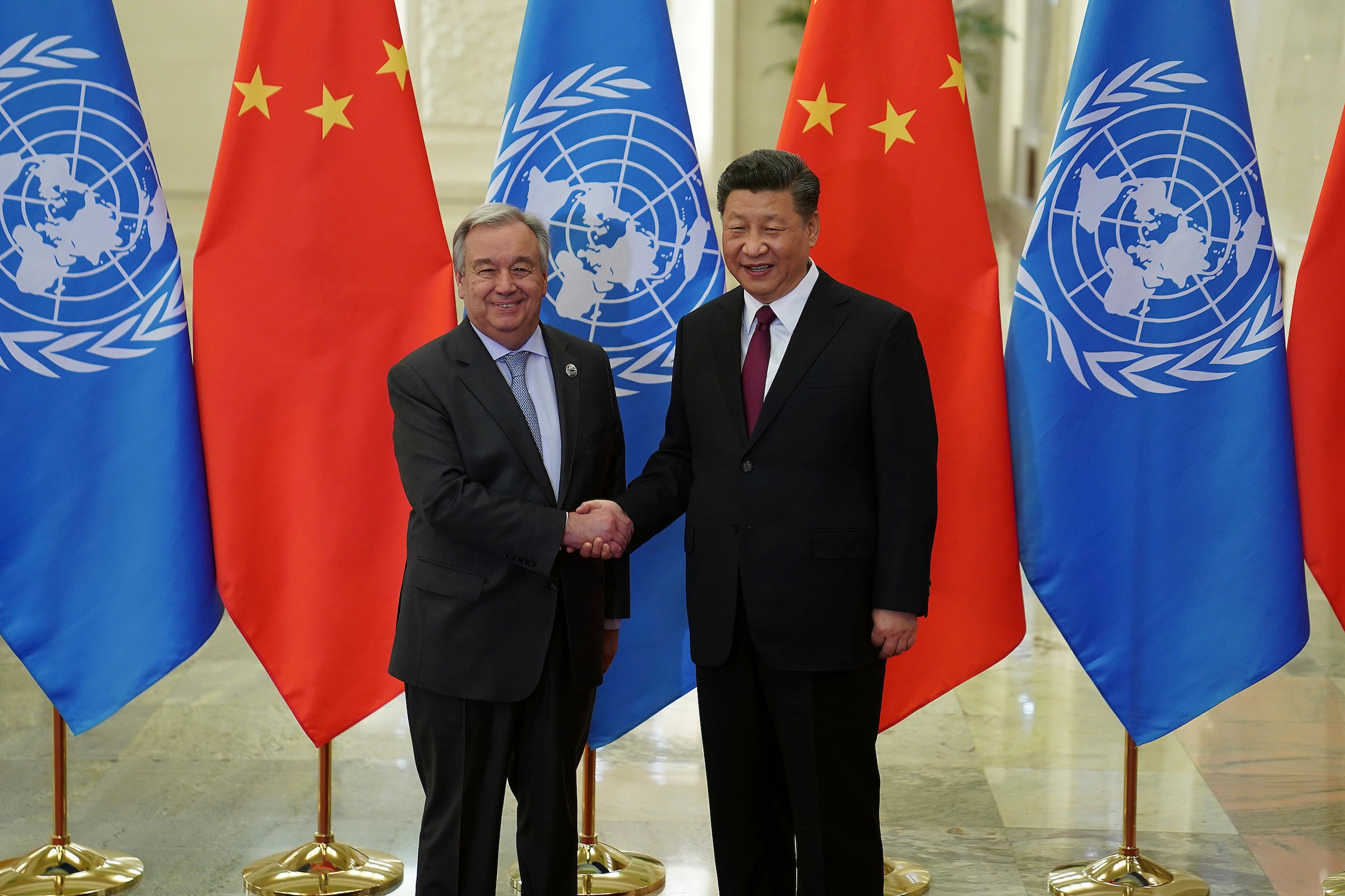 Chinese President Xi Jinping (right) shakes hands with United Nations Secretary-General Antonio Guterres at the Great Hall of the People in Beijing, April 26, 2019. 