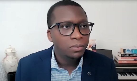 Still of Noel Zihabamwe.