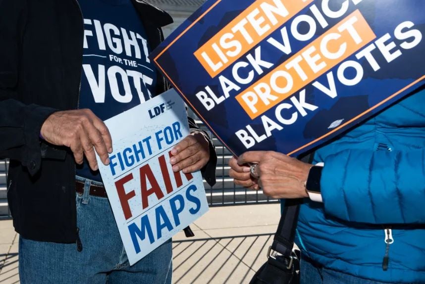 Activists gather outside the US Supreme Court for oral arguments in the Alexander V. South Carolina Conference of the NAACP gerrymandering case in Washington, DC, October 11, 2023.