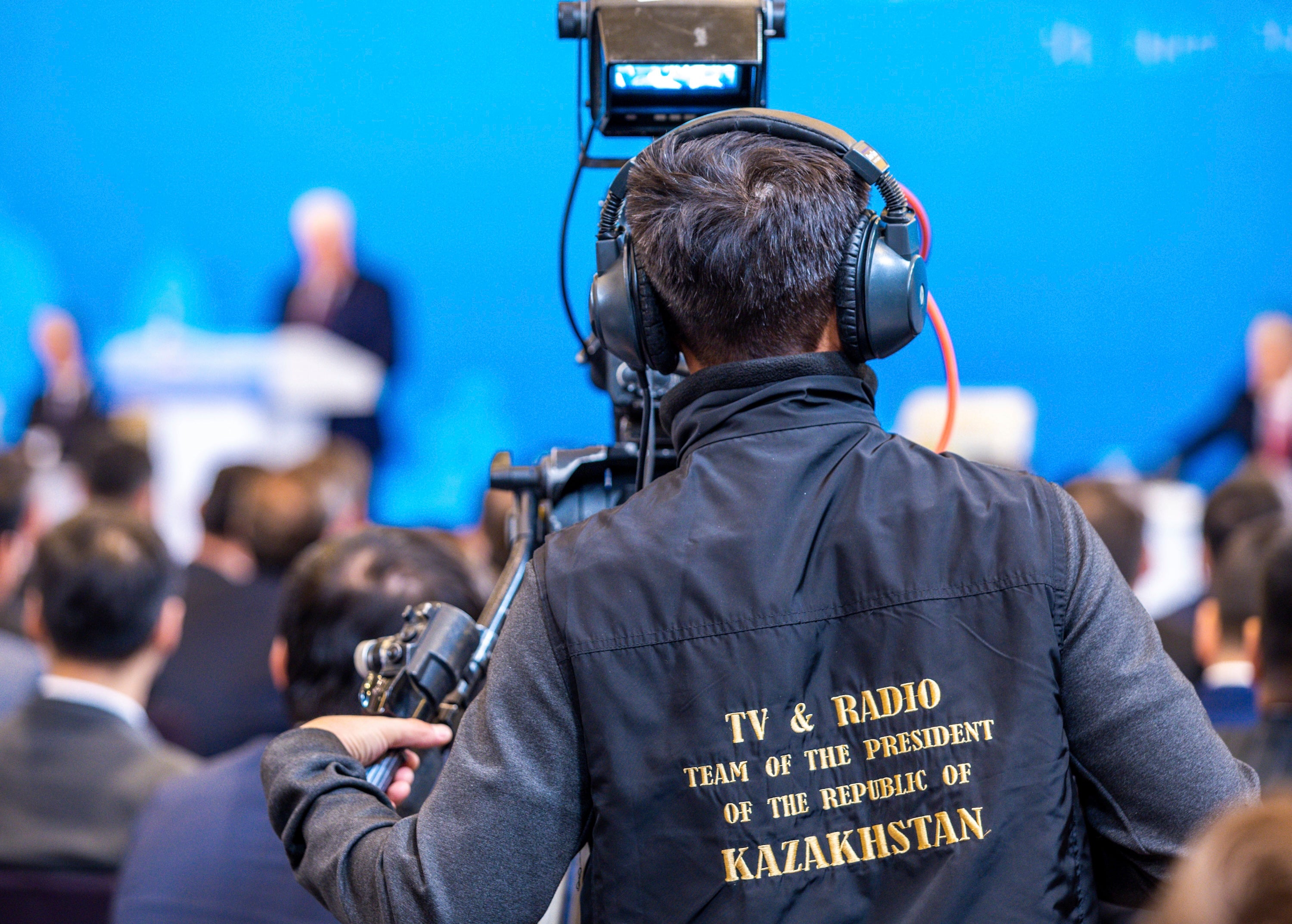 A cameraman from the "TV & Radio Team of the President of the Republic of Kazakhstan" films during the German-Kazakh Economic Forum, Astana, Kazakhstan, June 20, 2023.
