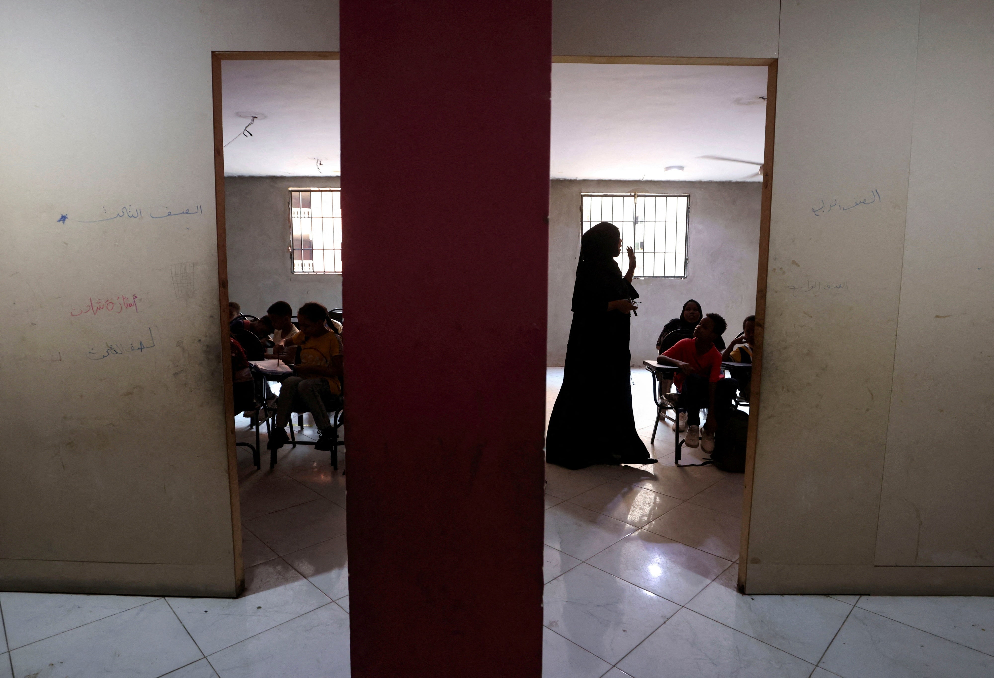 Sudanese students attend a class at a school teaching Sudanese curriculum, in Giza, Egypt, September 23, 2024. 