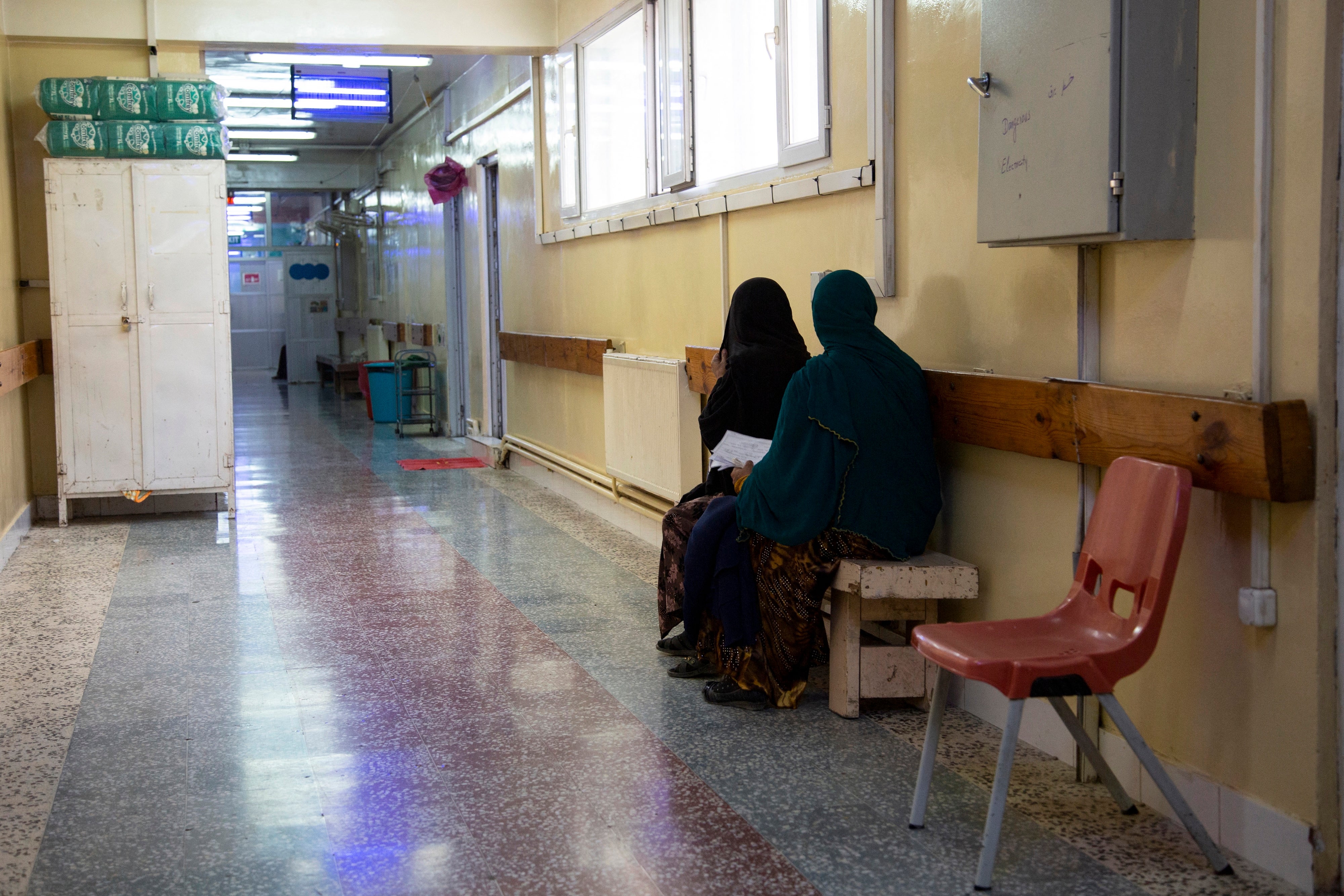 Pregnant women wait in the corridor of the maternity hospital run by Doctors Without Borders in Khost, Afghanistan, December 8, 2023.