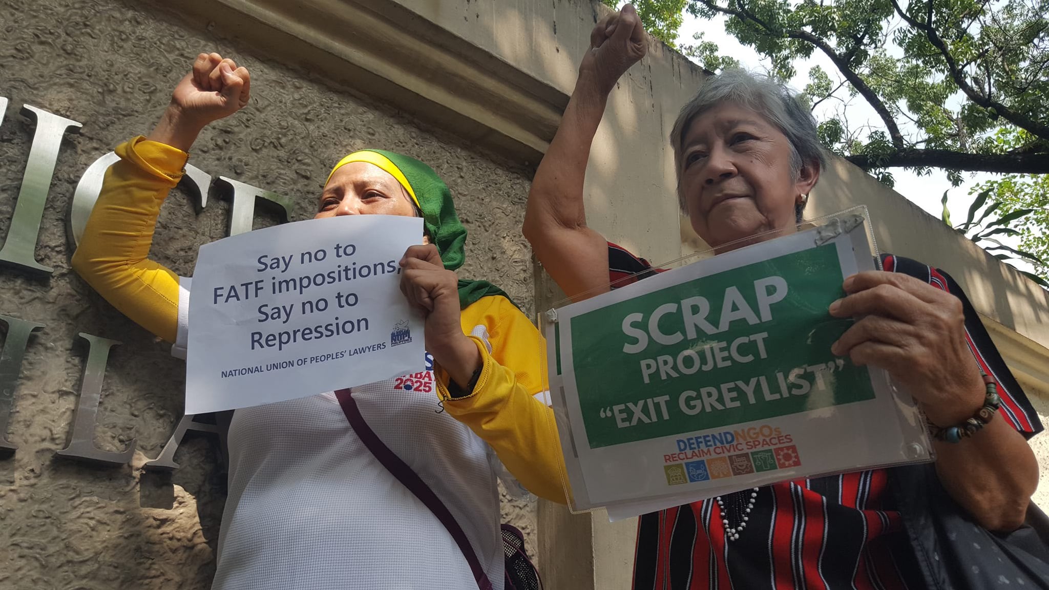 Protesters outside the Department of Justice denounce the filing of terrorist financing cases against activists and demand that the Marcos administration stop using the FATF's "grey list" to target civil society, Manila, Philippines, January 22, 2025.