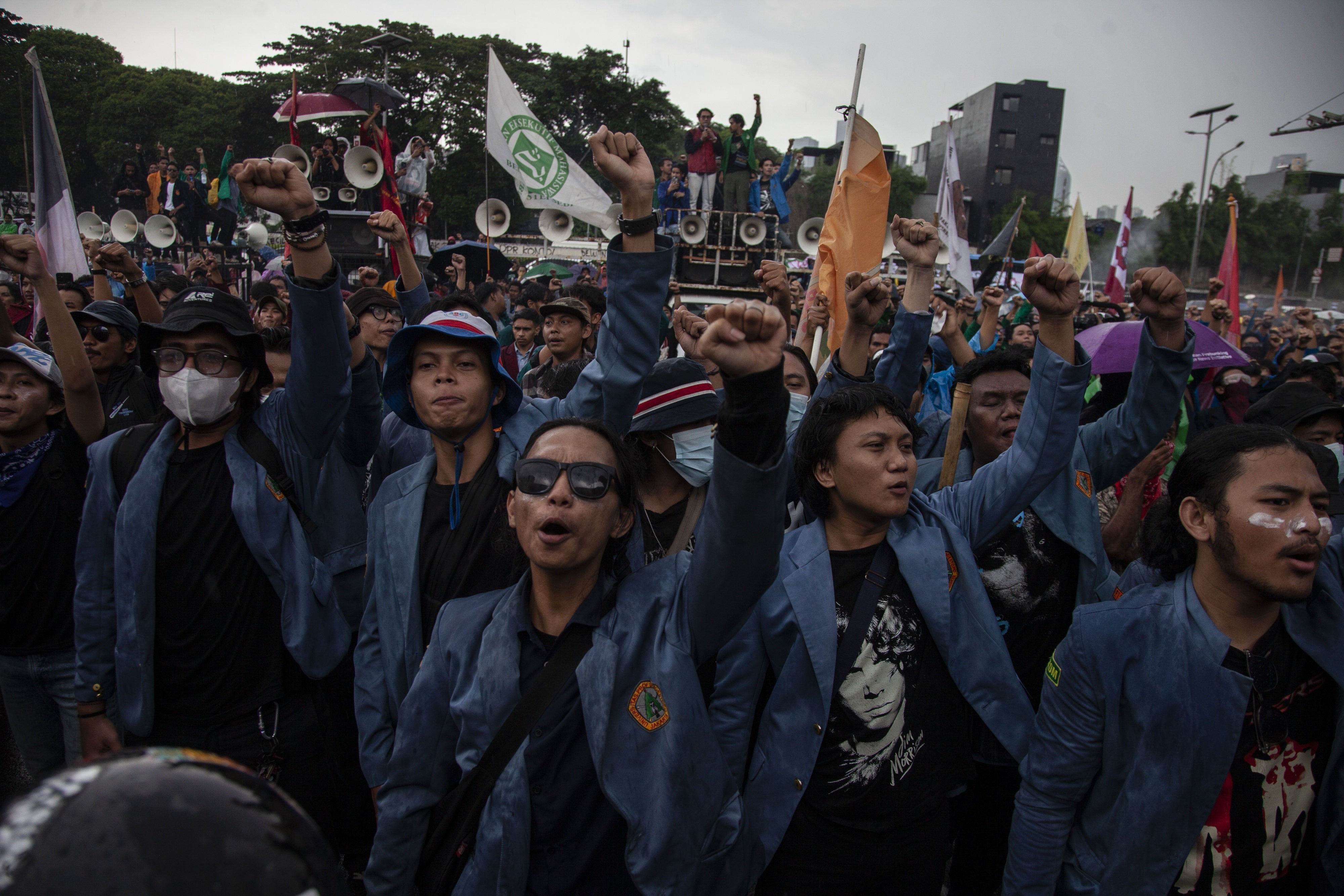 Students protest against a revision to the armed forces law outside the House of Representatives building in Jakarta, Indonesia, March 20, 2025.