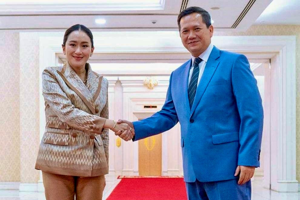 Paetongtarn Shinawatra, before she became Thai prime minister, meets with Cambodian Prime Minister Hun Manet during a visit to Phnom Penh, March 14, 2024. 