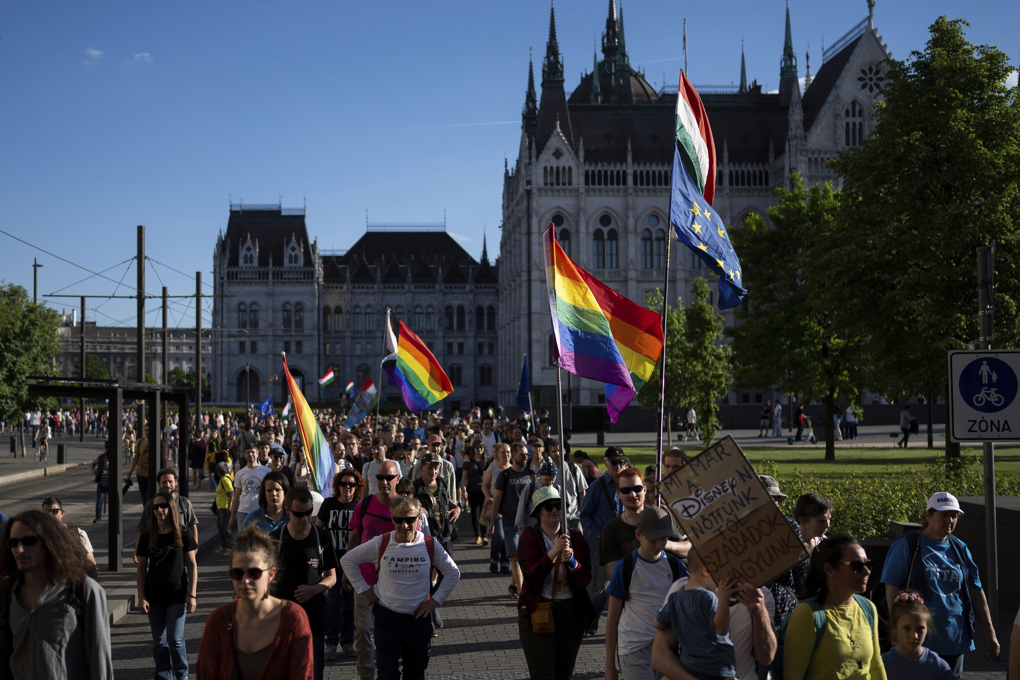 Hungarians march in downtown Budapest to protest against a new law banning LGBTQ+ Pride events and the populist government's restriction on assembly rights, May 1, 2025.