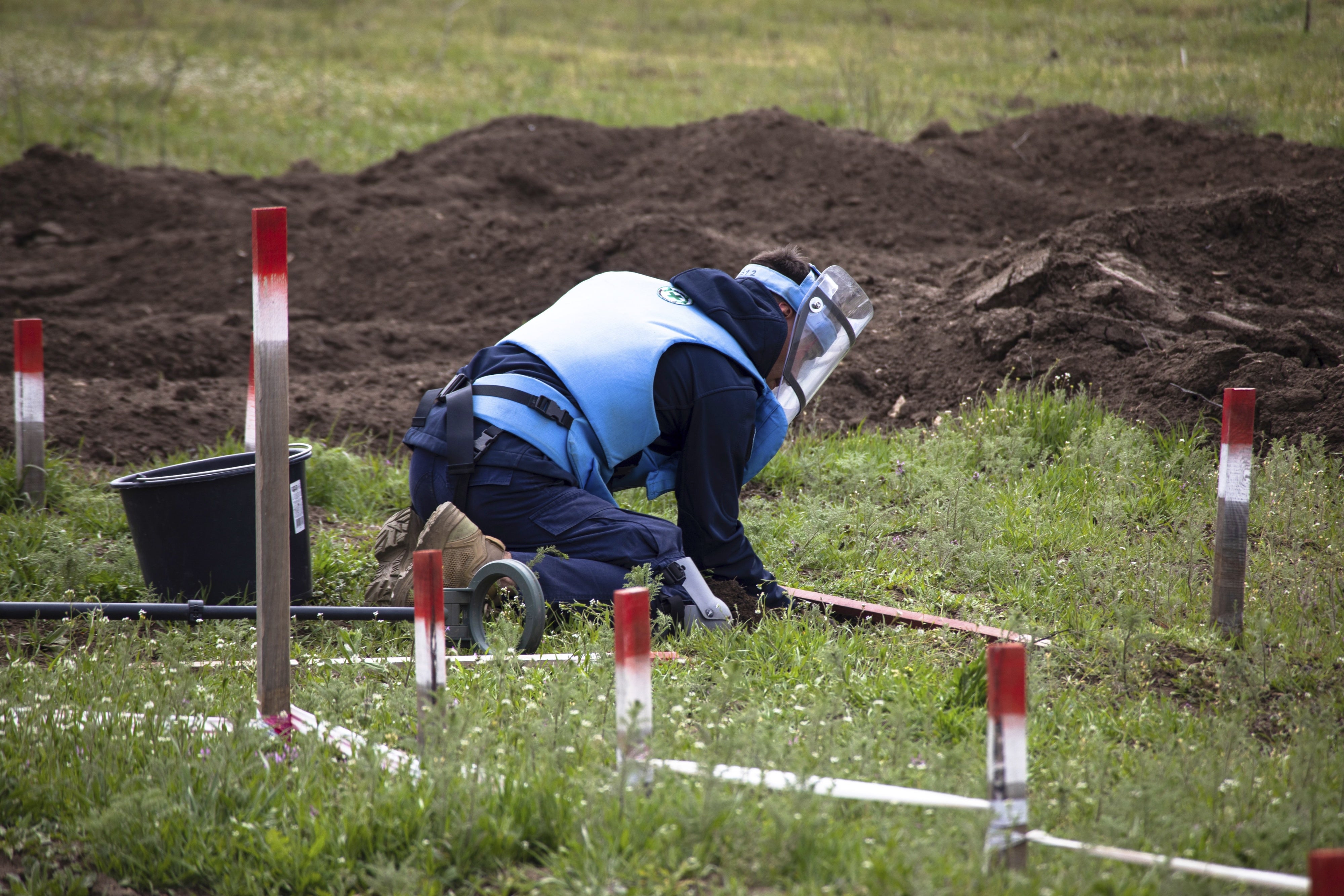 A humanitarian deminer at work in Mykolaiv region, Ukraine, April 16, 2025.