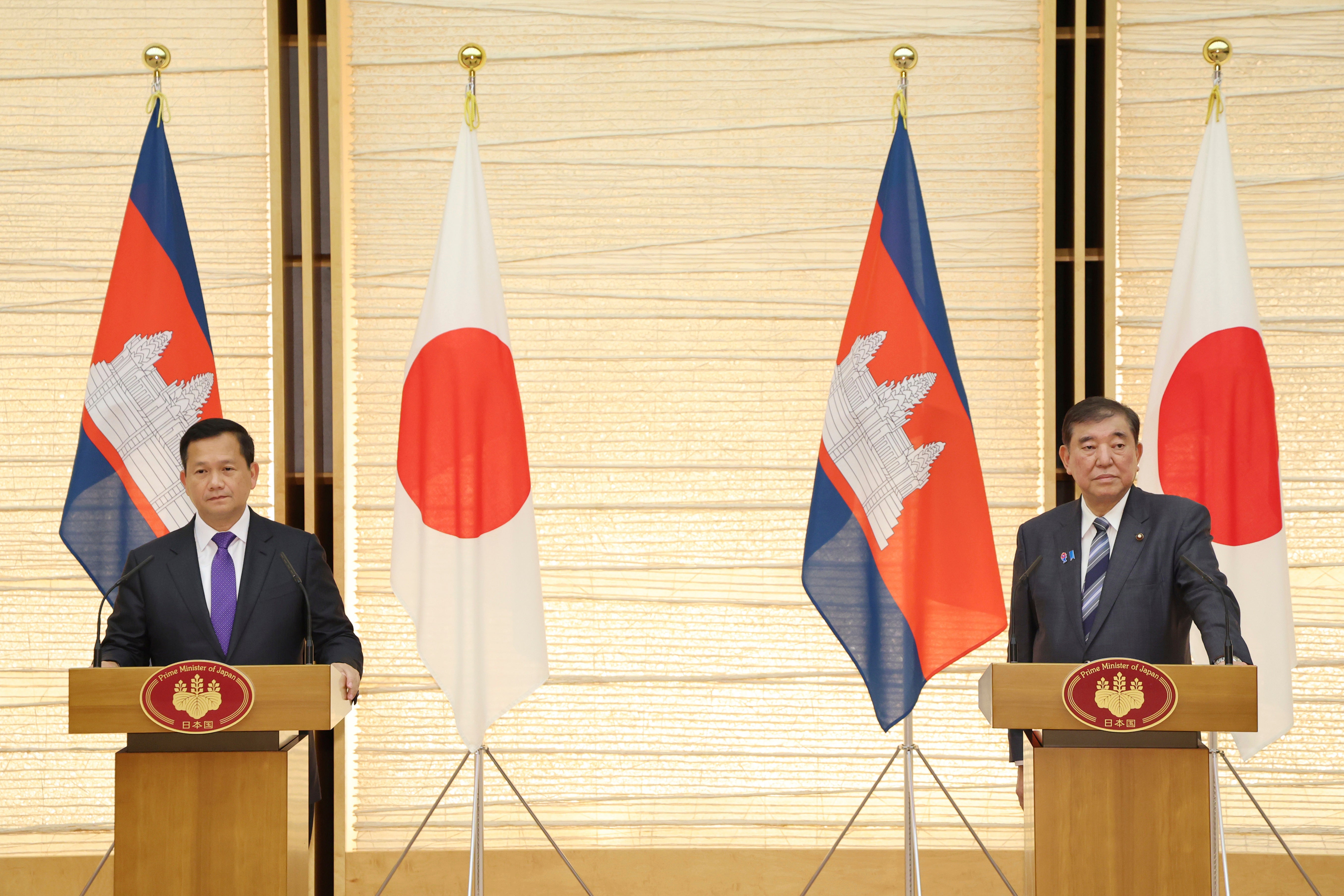 Japanese Prime Minister Shigeru Ishiba (R) and Cambodian Prime Minister Hun Manet attend a news conference after a bilateral talk at the Prime Minister's Office in Tokyo, May 30, 2025. 