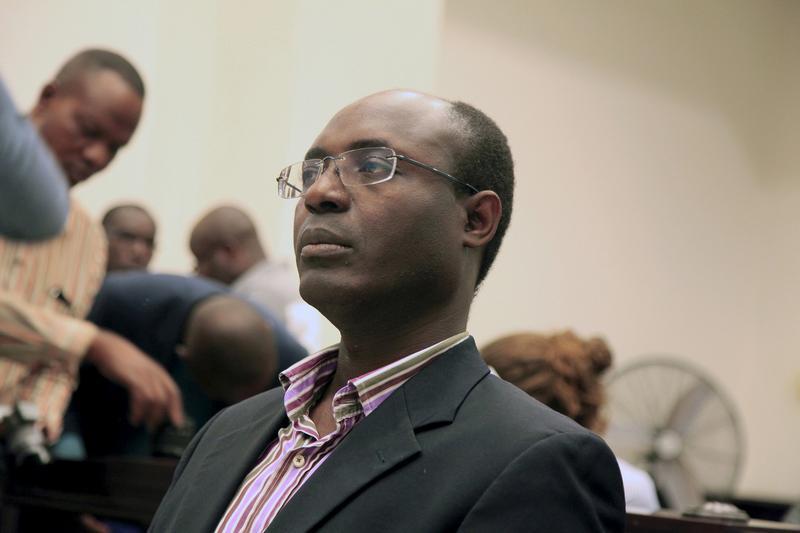 Journalist Rafael Marques de Morais sits in court in Luanda, Angola on May 28, 2015. 