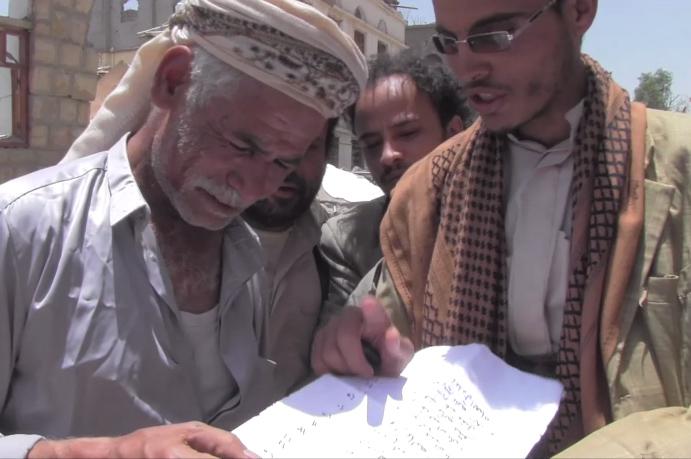 The al-Ibbi’s neighbors had written down the names and ages of the 27 dead. © 2015 Ole Solvang/Human Rights Watch 