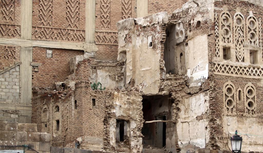 A view of the side of a damaged house in the historical city of Sanaa March 24, 2013. REUTERS/Mohamed al-Sayaghi