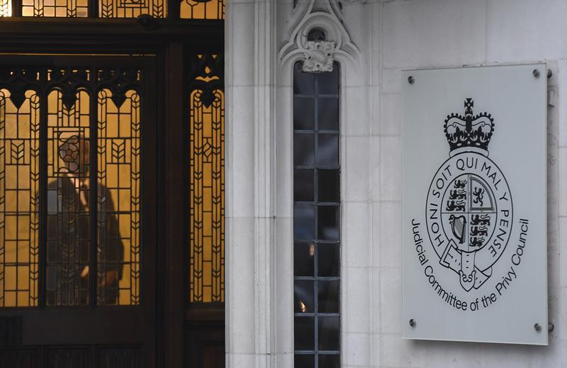 A member of security stands guard inside the Supreme Court in London, Britain, January 23, 2017.