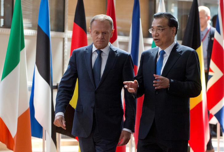 European Council President Donald Tusk and Chinese Premier Li Keqiang arrive at the EU-China Summit in Brussels on June 2, 2017.
