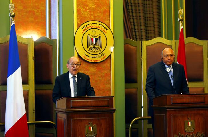 French Foreign Minister Jean-Yves Le Drian (L) speaks during a joint news conference with Egyptian Foreign Minister Sameh Shoukry in Cairo, Egypt June 8, 2017. 