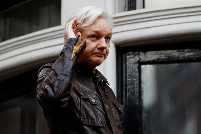 WikiLeaks founder Julian Assange is seen on the balcony of the Ecuadorian Embassy in London, Britain, May 19, 2017.