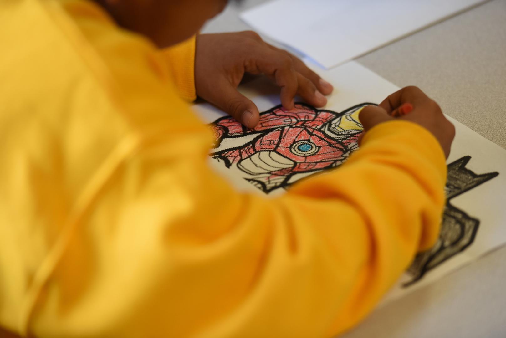Migrant Child Draws Picture