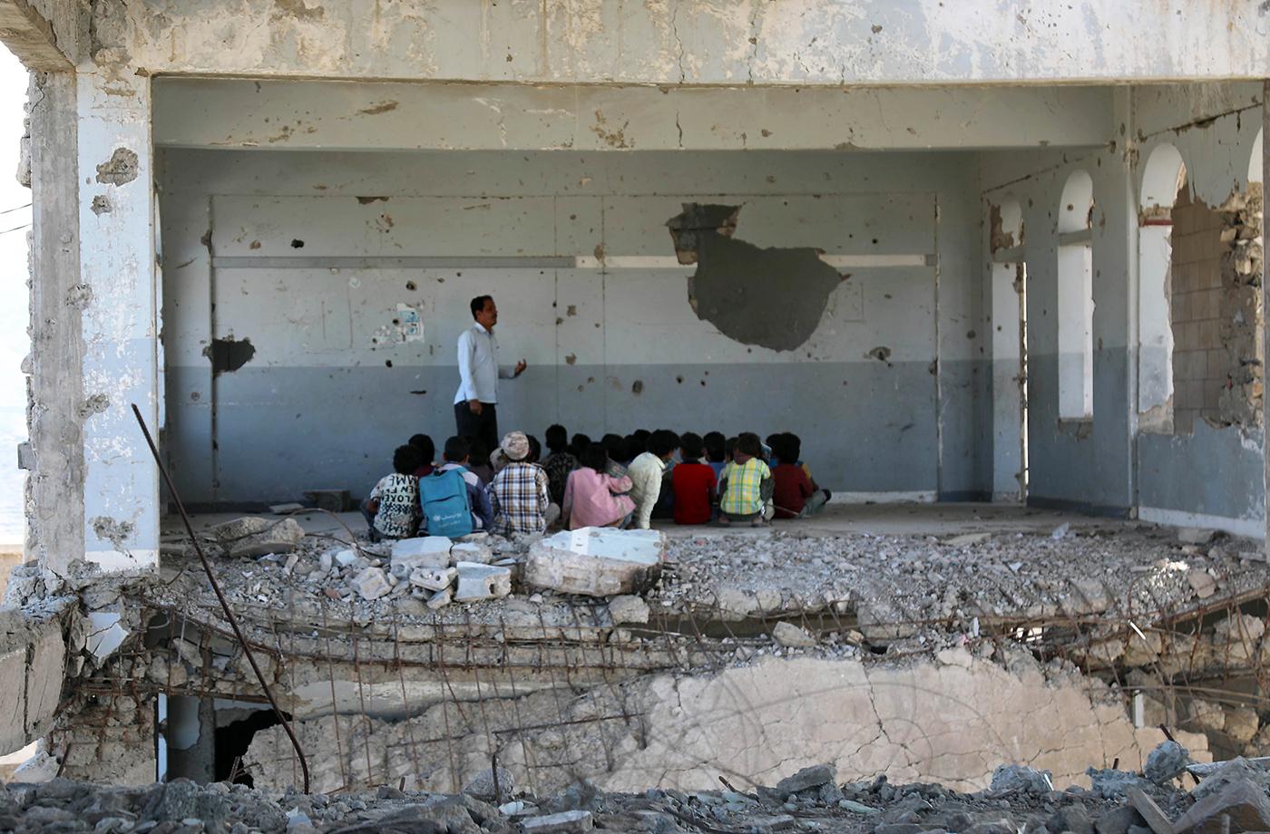 Children attending class on the first day of school. An airstrike damaged the school during fighting between Saudi-led coalition-backed Yemeni government forces and Houthi forces, Taizz, Yemen, September 3, 2019.
