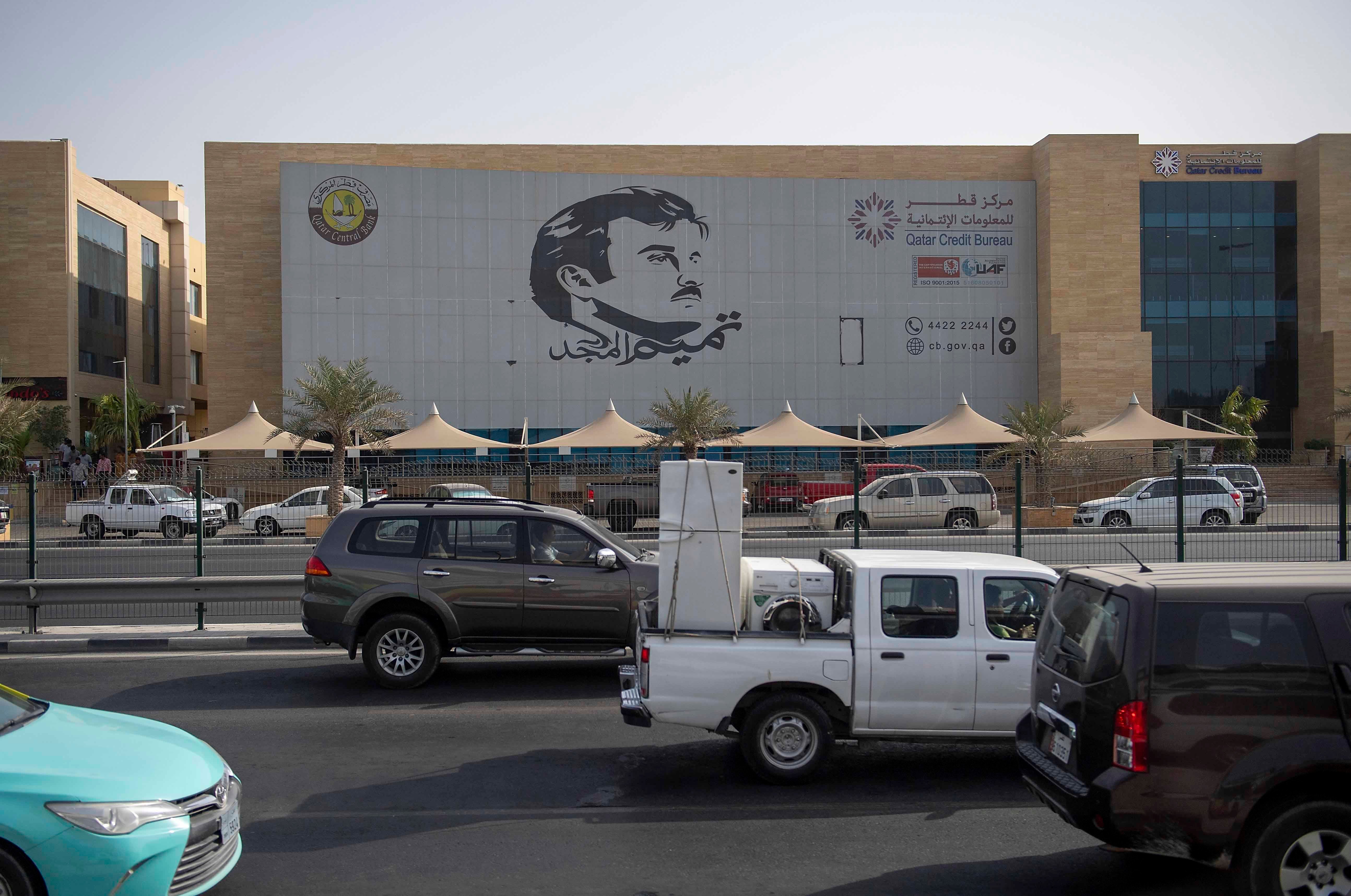 An image of the Emir Sheikh Tamim bin Hamad Al Thani on a building in Doha, Qatar.