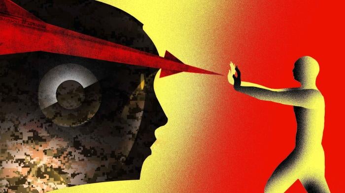 A silhouette of a man sticking his hands out as if to push back on an artistic depiction of a missile aimed at him.