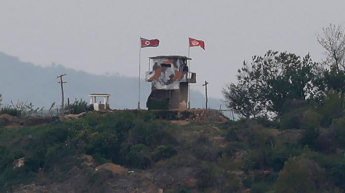 A North Korean flag flutters in the wind at a military guard post seen from the South Korean city of Paju, at the border with North Korea, May 3, 2020. 