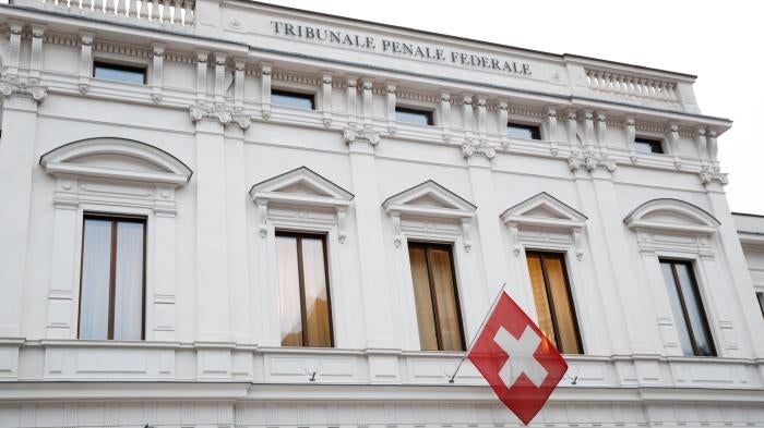 Switzerland's national flag flies over the entrance of the Swiss Federal Criminal Court (Bundesstrafgericht) in Bellinzona, Switzerland March 5, 2020.
