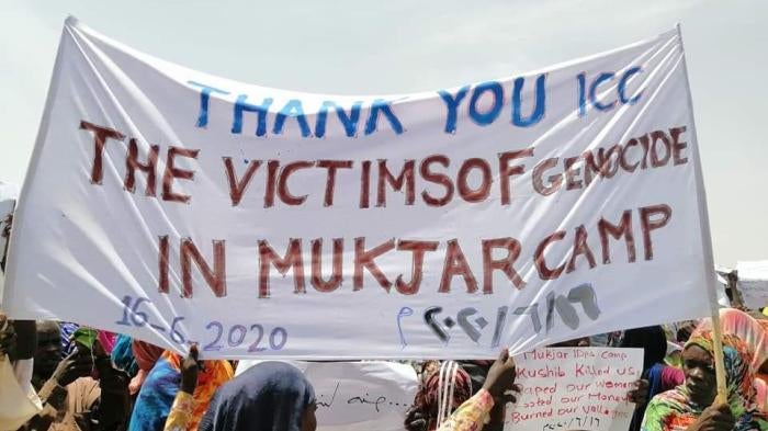 Displaced people in Ardamata camp in El Geneina, capital of West Darfur, welcoming the start of proceedings in the case against “Janjaweed” militia leader Ali Kosheib at the International Criminal Court. 