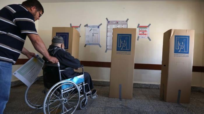 A voter who uses a wheelchair at a polling place in Erbil, the capital of the Kurdistan Region of Iraq, on May 12, 2018.