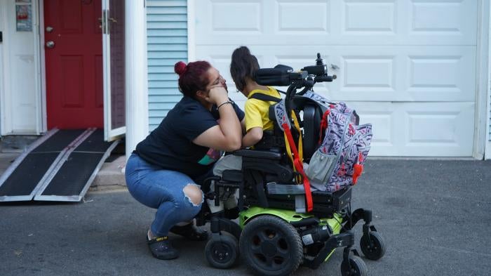 Woman sitting with her child