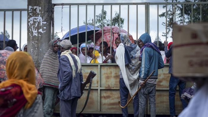Displaced Ethiopians from different towns in the Amhara region wait for aid distributions at a center for the internally-displaced in Debark, in the Amhara region of northern Ethiopia August 26, 2021. 