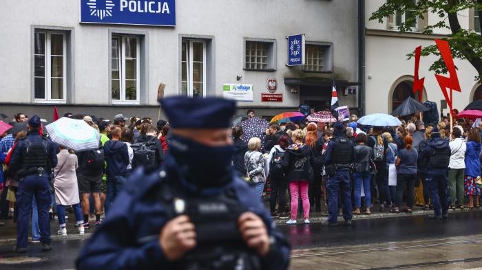 People demonstrate outside a police station during 'Solidarity with Joanna' protest in Krakow, Poland on July 25, 2023.