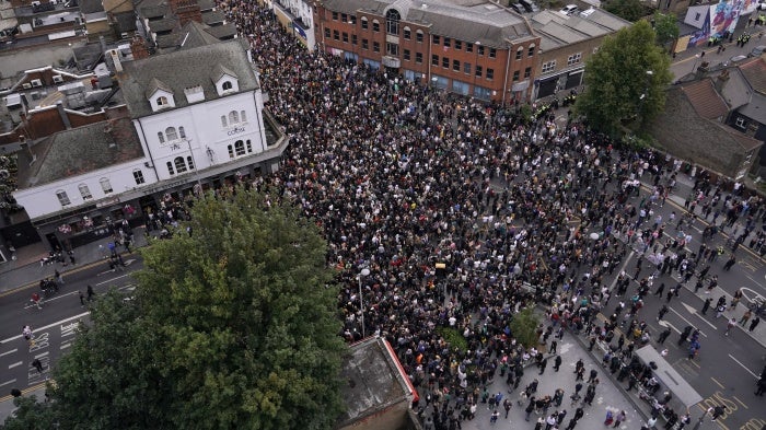 General view of people gathering to protest against a planned far-right anti-immigration protest in Walthamstow, London, Wednesday, Aug. 7, 2024.