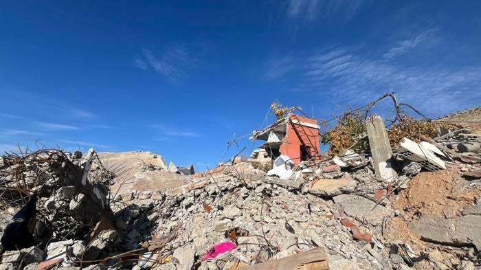 The remnants of a destroyed a two-story building after an Israeli strike on November 1, 2024, in the al-Salah neighborhood in Younine, Lebanon. 