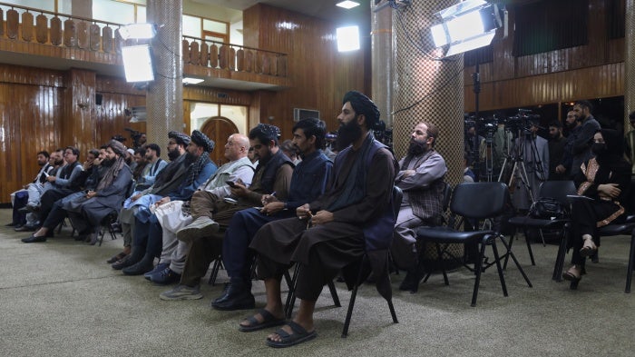 Officials and Journalists attend a Taliban press conference at the Government Media and Information Center in Kabul, Afghanistan, October 12, 2025.