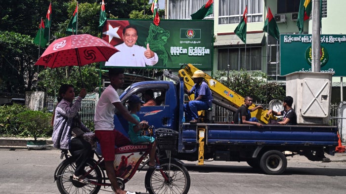 A billboard of the chairman of the Myanmar military-backed Union Solidarity and Development Party ahead of the start of the campaign period for the junta’s elections in Yangon, October 27, 2025. 