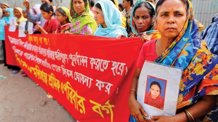  Victims of the 2013 Rana Plaza building collapse and their families demonstrating at the site of the disaster demanding full compensation. 