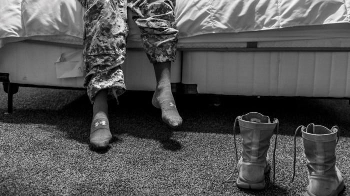 A US Army specialist and military sexual assault survivor on her bed in Fayetteville, North Carolina.