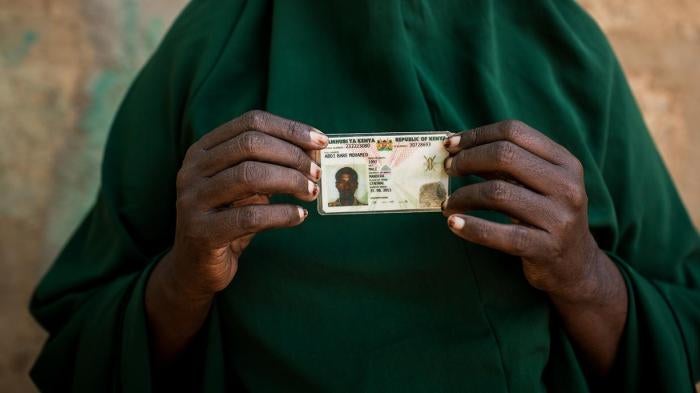Zeinab Bulley Hussein holding the national identity card of her son, Abdi Bare Mohamed. Community members stumbled on Abdi Bare’s dead body 18 kilometers from Mandera, in northeastern Kenya, three weeks after police officers arrested him outside the famil