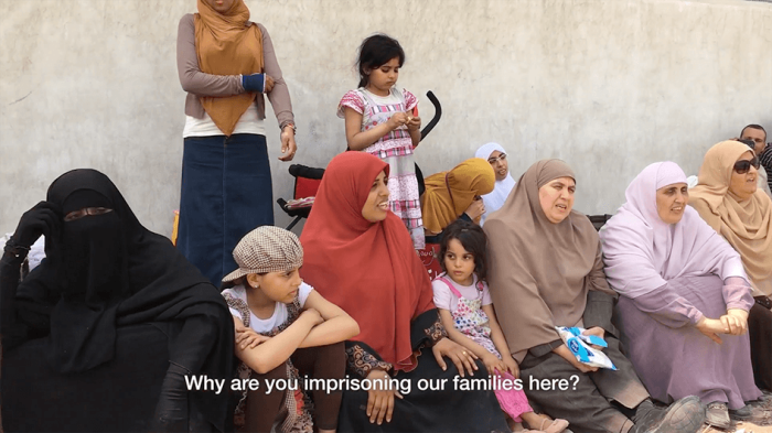 Families of detainees in Egypt's Scorpion Prison gather near the prison walls to protest lack of visits.