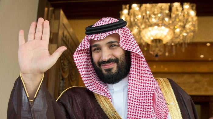 Image of Saudi Crown Prince Mohammad Bin Salman waving his hand.