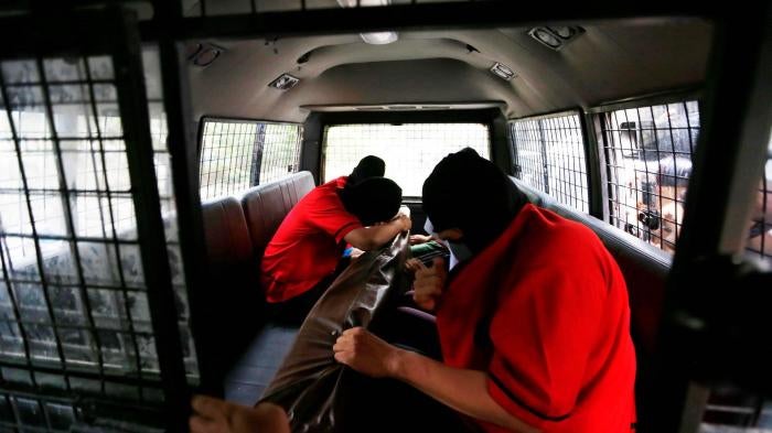 Some of the 51 men, including foreign nationals, arrested during a police raid on what they described as a “gay spa” in Jakarta on October 6, 2017.