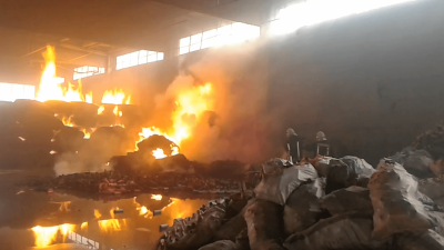 Fire on building takes caused by an incendiary weapon.